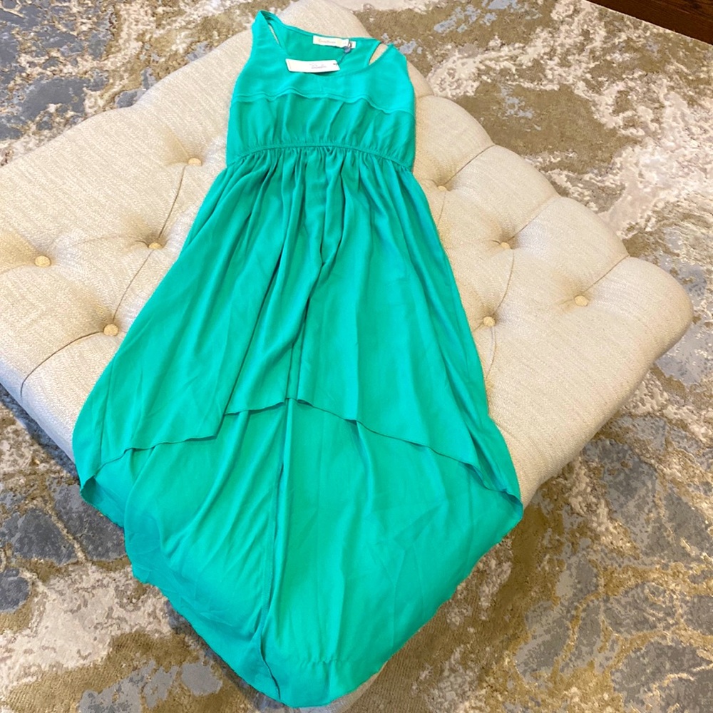 Costa Blanca summer dress. Shorter in front and longer in the back.